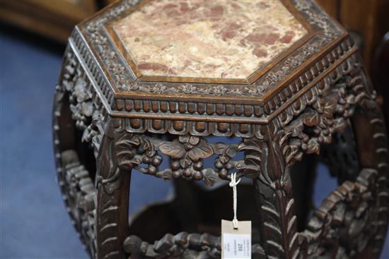 A late 19th century Chinese hardwood garden seat, 1ft 9in.